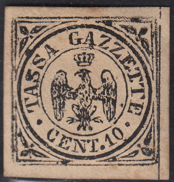 BO24_258 - 1859 - Aquila estense, Tassa Gazzette cent. 10 nero su carta crema non emesso, nuovo con gomma originale (5/I).