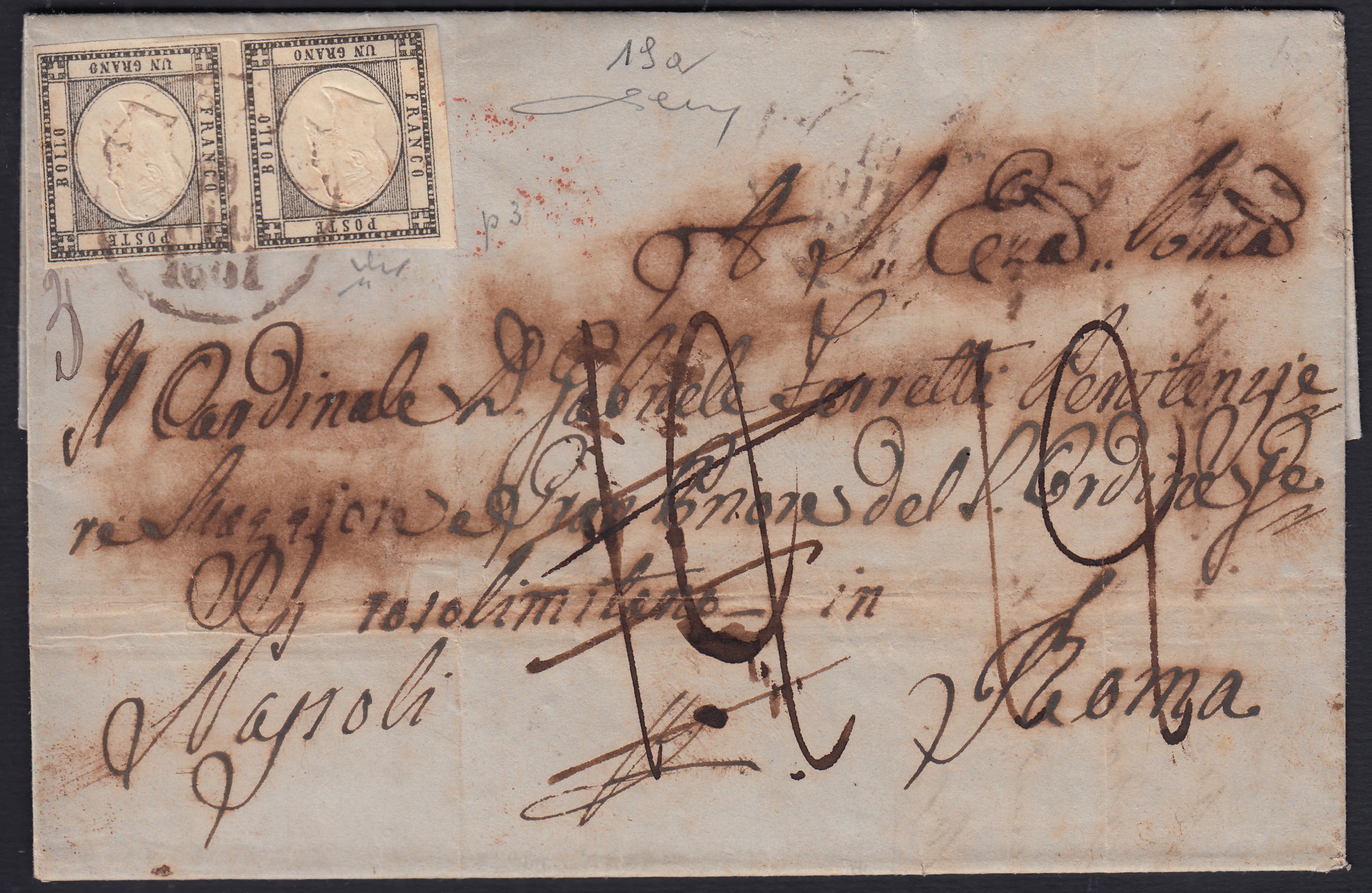 BO2512_24 - 1861 - lettera da Modugno per Roma postalizzata a Trani, affrancata con 1 grano grigio nero coppia e viaggiata via di terra e tassata 12 baj, poi corretta e ritassata. (19a)
