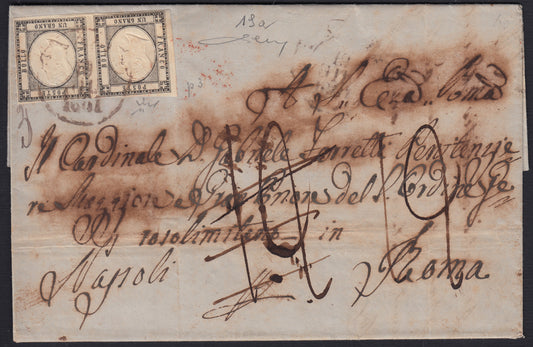 BO2512_24 - 1861 - lettera da Modugno per Roma postalizzata a Trani, affrancata con 1 grano grigio nero coppia e viaggiata via di terra e tassata 12 baj, poi corretta e ritassata. (19a)