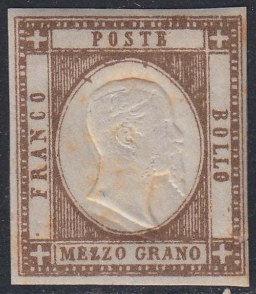 PN35 - 1861 - Effigie di Vittorio Emanuele II volta a destra, 1/2 grano bruno intenso nuovo con gomma integra e doppia effigie, (18d, gradazione).