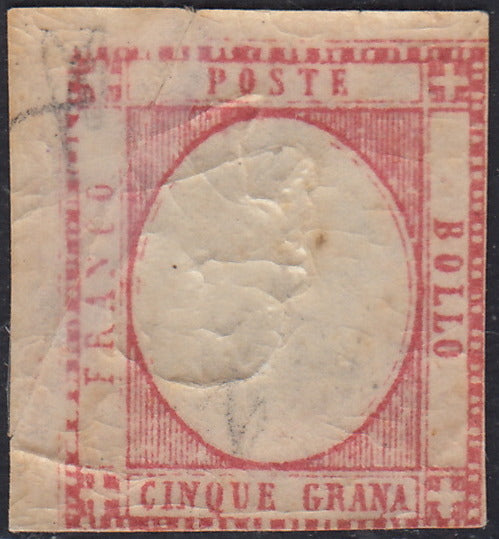 PN229 - 1861 - Effigie di Vittorio Emanuele II volta a destra, 5 grana carminio con effigie capovolta e stampa a verso dalla parte della gomma (recto-verso), . (21g/h).