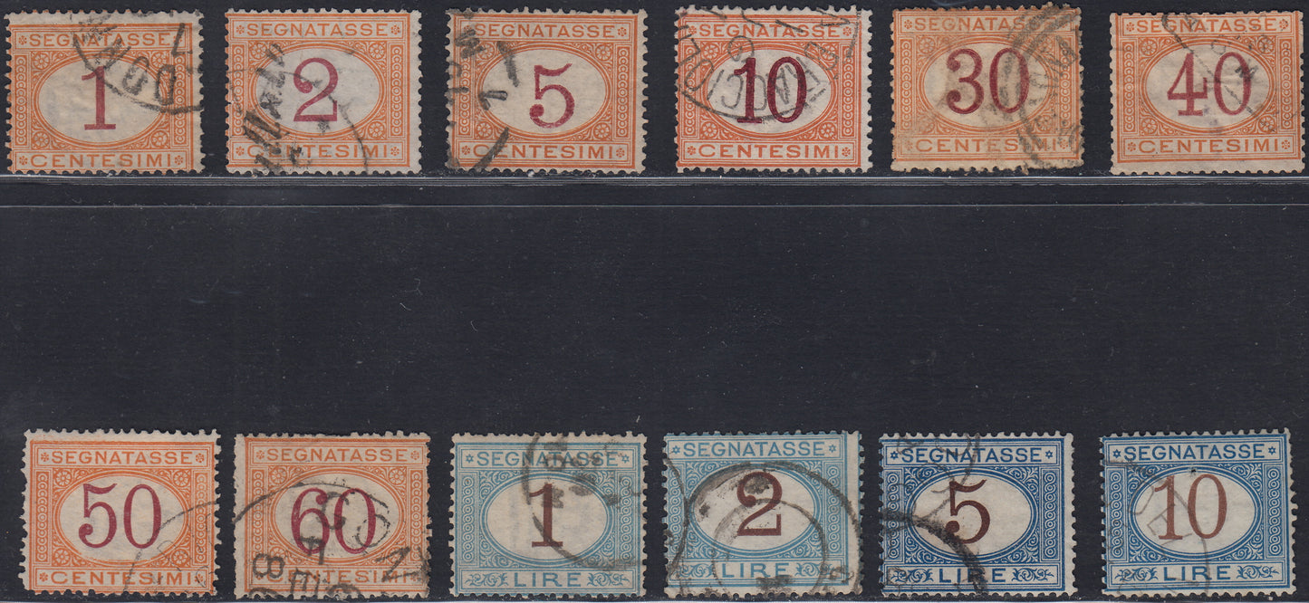 VEII57 - 1870/74 - Cifra del valore in un ovale e diciture orizzontali, serie completa di 12 valori colori ocra e carminio e azzurro e bruno I tiratura,(3/14).