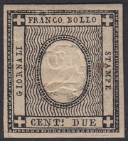 PV588 - 1861 - Cifra a rilievo, c. 2 nero intenso, nuovo con gomma originale, rara e pregevole gradazione di colore con stampa parassitaria dell'ovale. (20e).