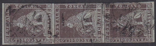 PV2090 - 1851 - Leone di Marzocco, 9 crazie bruno violaceo su carta azzurra e filigrana corona striscia di tre usata (8b).