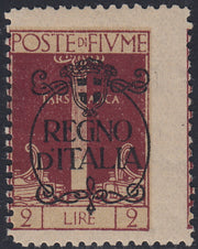 Fiume265 - 1920 - Sello de la serie Legionarios sobreimpreso por la Regencia italiana de Carnaro, L.10 sobre c.20 ocre con números en primer plano, nuevo sin goma (146A).