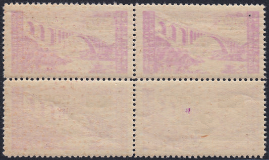 T126 - Franqueo fiscal, 2L. en 30c. bloque lila de cuatro ejemplares con tapón tipo I y II, goma nueva y sin daños (7 + 7/II)