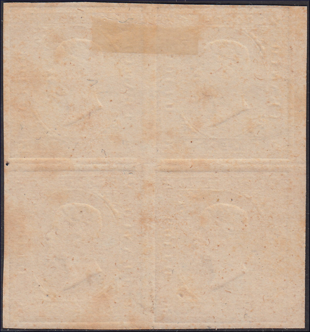 YY150 - 1877 - II emissione Imitazioni usigli con stampa a secco su carta media, c. 20 impressione a secco su carta bianca blocco di quattro esemplari nuovo non gommato.