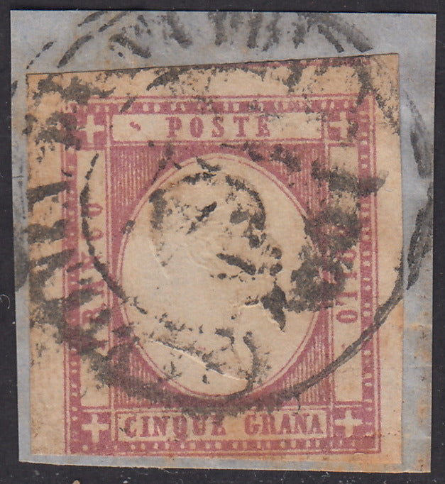 1861- 5 grana lilla scuro usato su frammento con annullo "Partenza da Napoli", un margine sfiorato (21d).